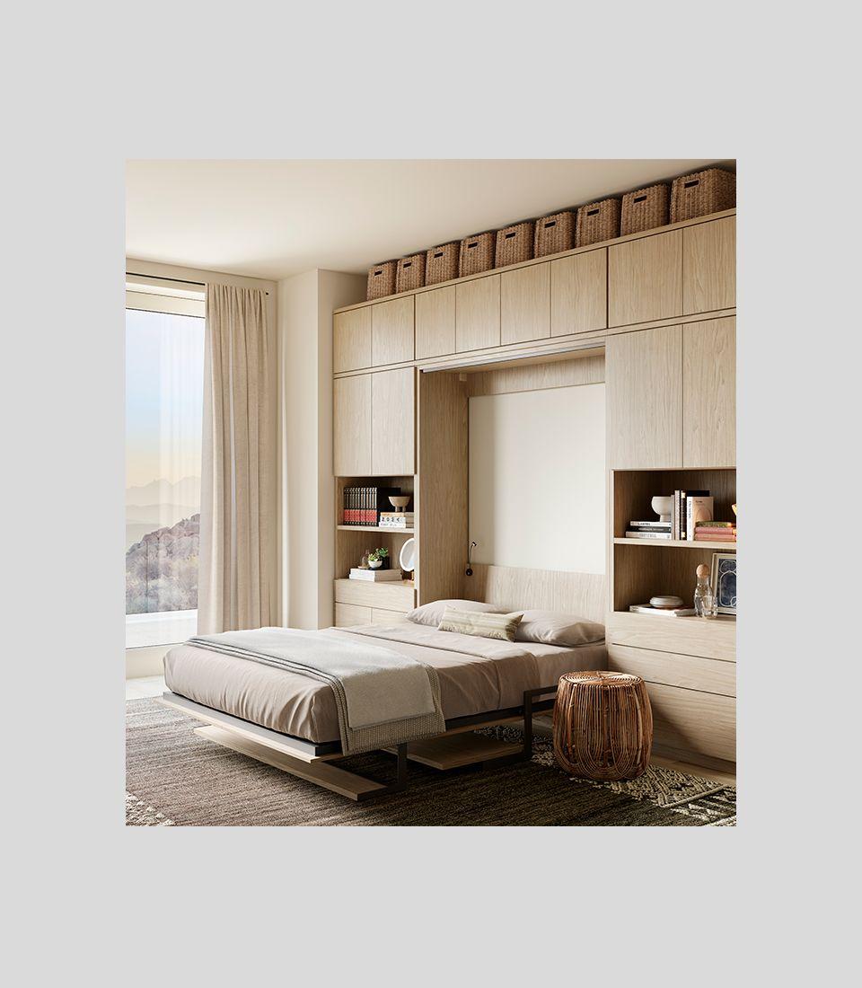 Opened Murphy bed with built in home office desk with custom stoarge cabinets and drawers by California Closets
