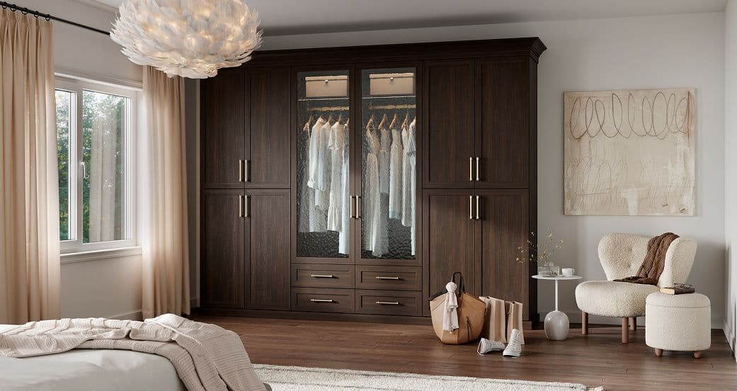 Custom wardrobe providing clothing storage in a small bedroom without a built-in closet.