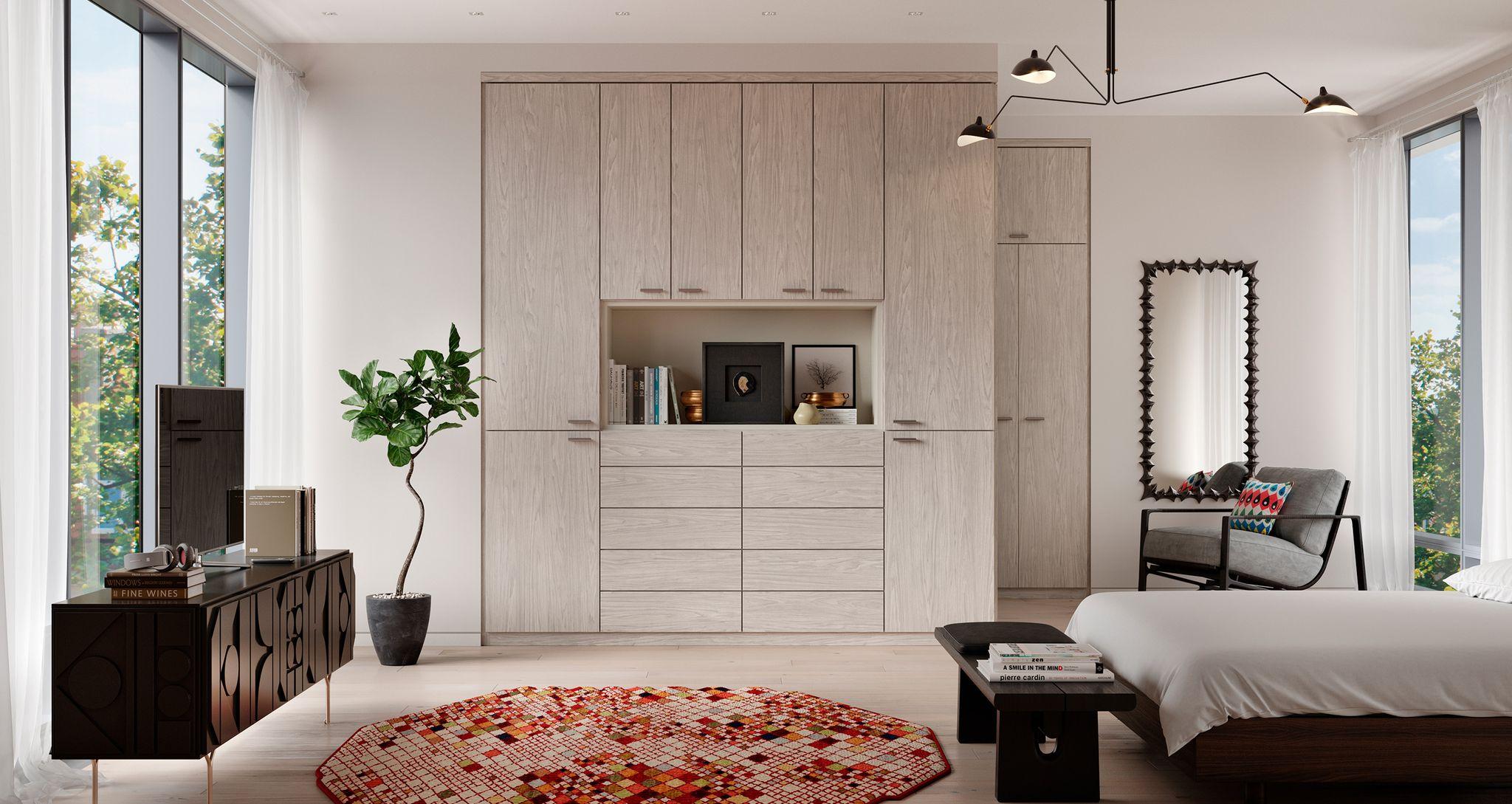 Custom wardrobe designed for a small apartment bedroom with floor-to-ceiling storage and modern finishes.