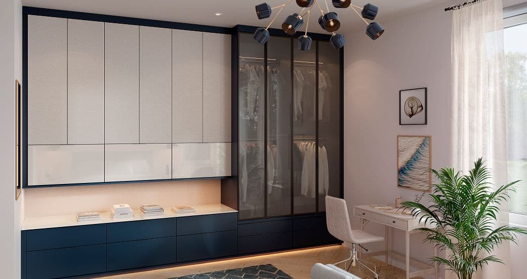 Modern custom wardrobe with light finishes designed to maximize storage in a small bedroom.