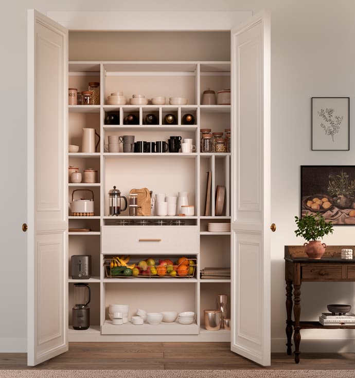 Reach in custom pantry closet with specialy stoage shelving and cubbies in white wood grain finish by California Closets